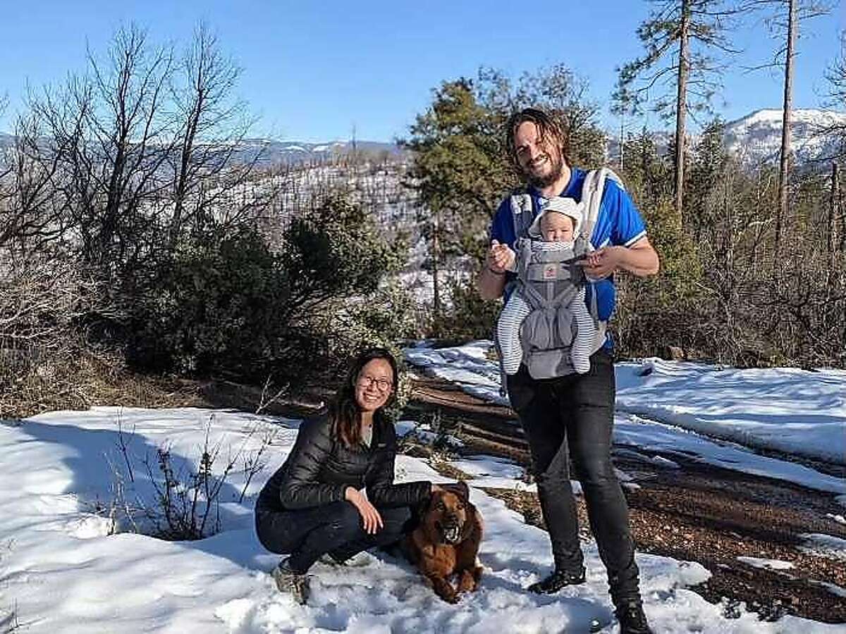 A photo of Ellen Chung, left, and Jonathan Gerrish, holding their 1-year old daughter, Miju. All were found dead on a hiking trail in Mariposa. The cause of death has not yet been determined.