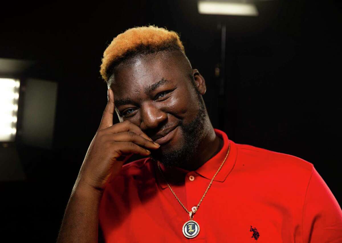 Rapper Miles Segun-Oside, known as Kilometers, poses for a photograph Tuesday, July 27, 2021, at Houston Chronicle video studio in Houston.