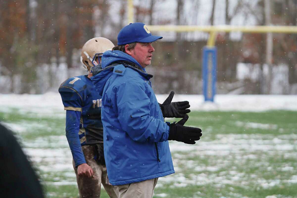 Onekama head football coach John Neph coaches from the sidelines during a game in 2018. (File photo)