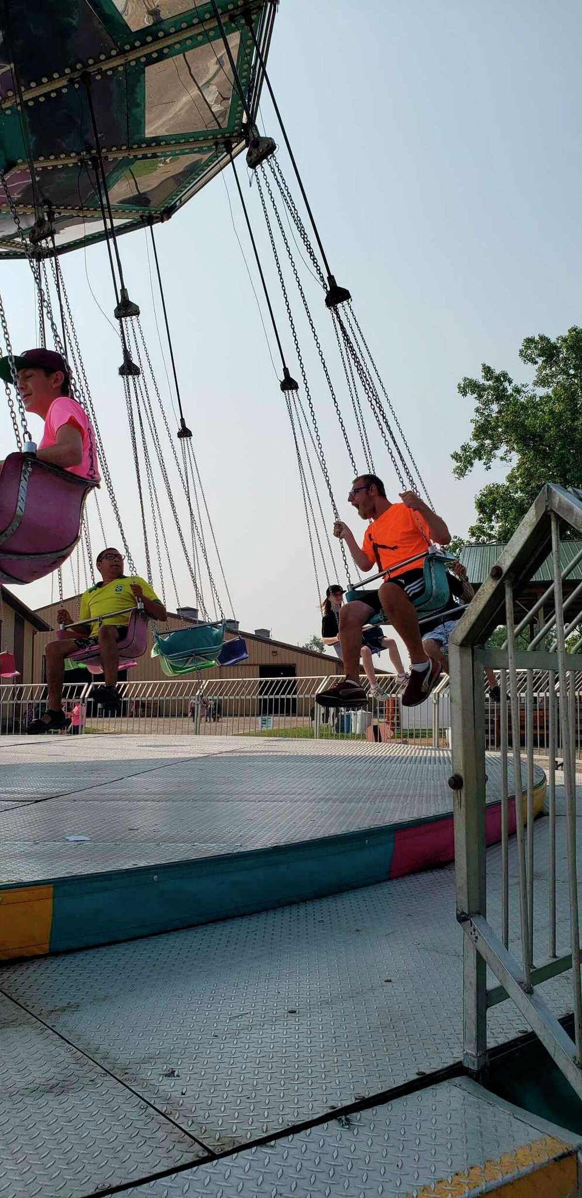 Kids enjoyed riding the swings at the Huron Community Fair. (Courtesy Photo)