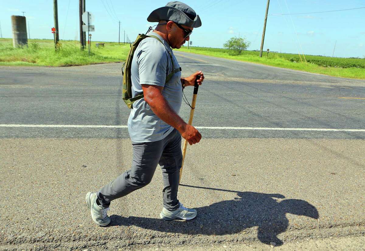 Ramon Castro walks along Military Highway near Progreso earlier this month. A reader showers praise on his effort to bring awareness to veterans who face deportation.