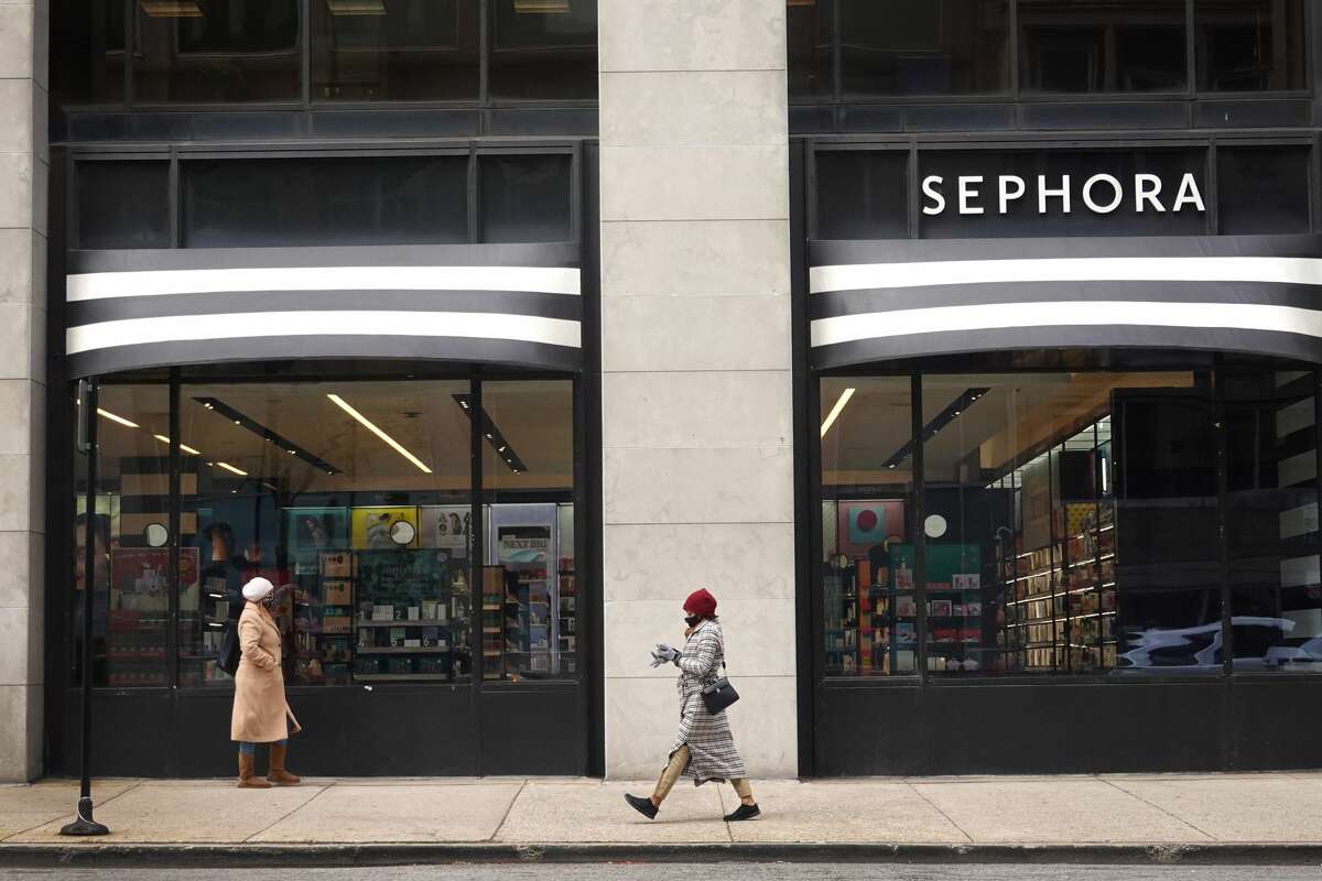 A pedestrian walks past a Sephora store in Chicago, Illinois.