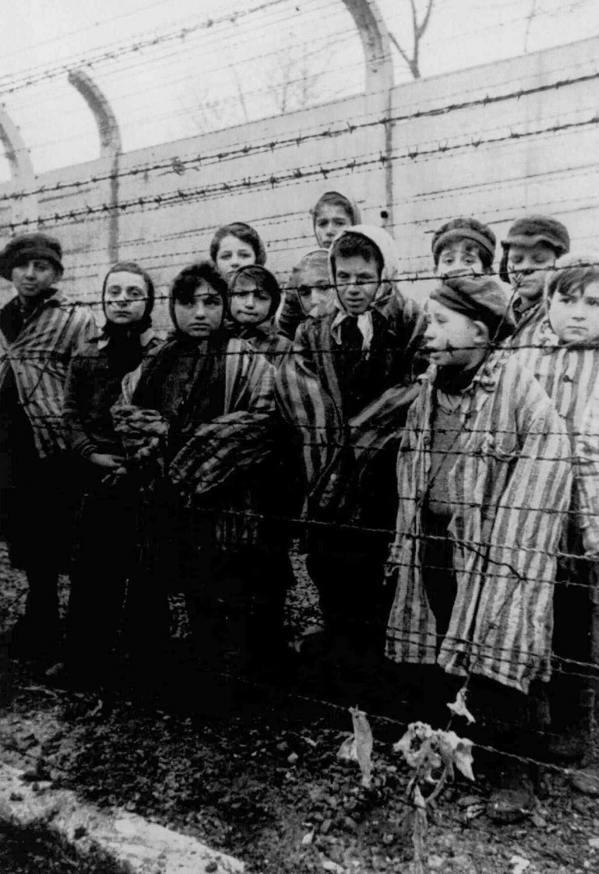 Children on the verge of liberation from Auschwitz. The Holocaust was an atrocity, not one to be debated with opposing viewpoints.