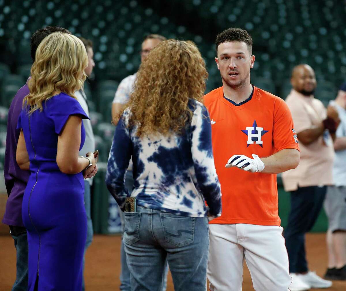 Houston Astros Alex Bregman, who has been rehabbing recently at the Sugar Land Skeeters speaks to reporters during batting practice before the start of an MLB baseball game at Minute Maid Park, Saturday, August 21, 2021, in Houston.