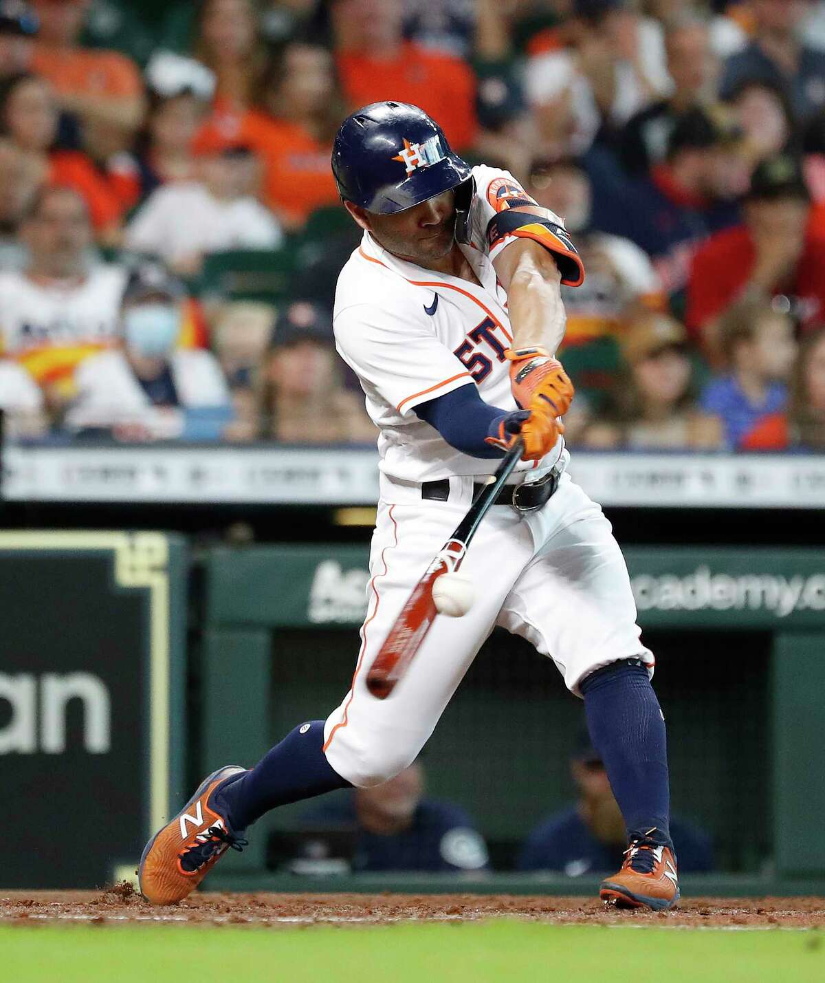 Houston Astros Jose Altuve (27) hits a single off Seattle Mariners starting pitcher Logan Gilbert during the third inning of an MLB baseball game at Minute Maid Park, Saturday, August 21, 2021, in Houston.