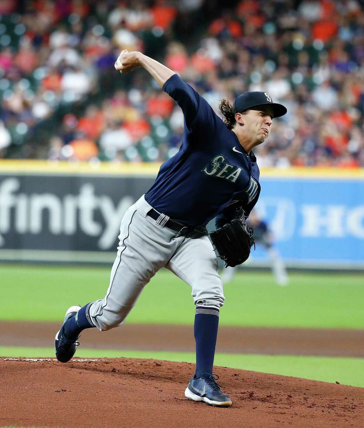 Seattle Mariners starting pitcher Logan Gilbert (36) pitches to Houston Astros Jose Altuve during the first inning of an MLB baseball game at Minute Maid Park, Saturday, August 21, 2021, in Houston.