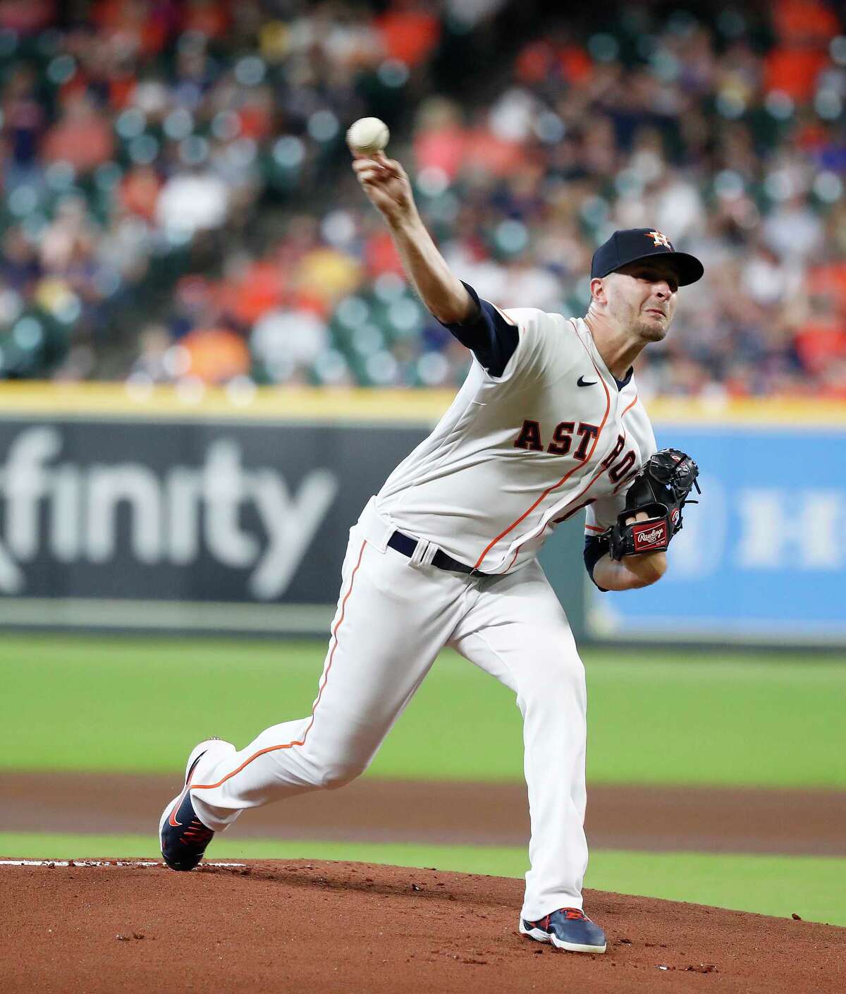 Houston Astros starting pitcher Jake Odorizzi (17) pitches during the first inning of an MLB baseball game at Minute Maid Park, Saturday, August 21, 2021, in Houston.