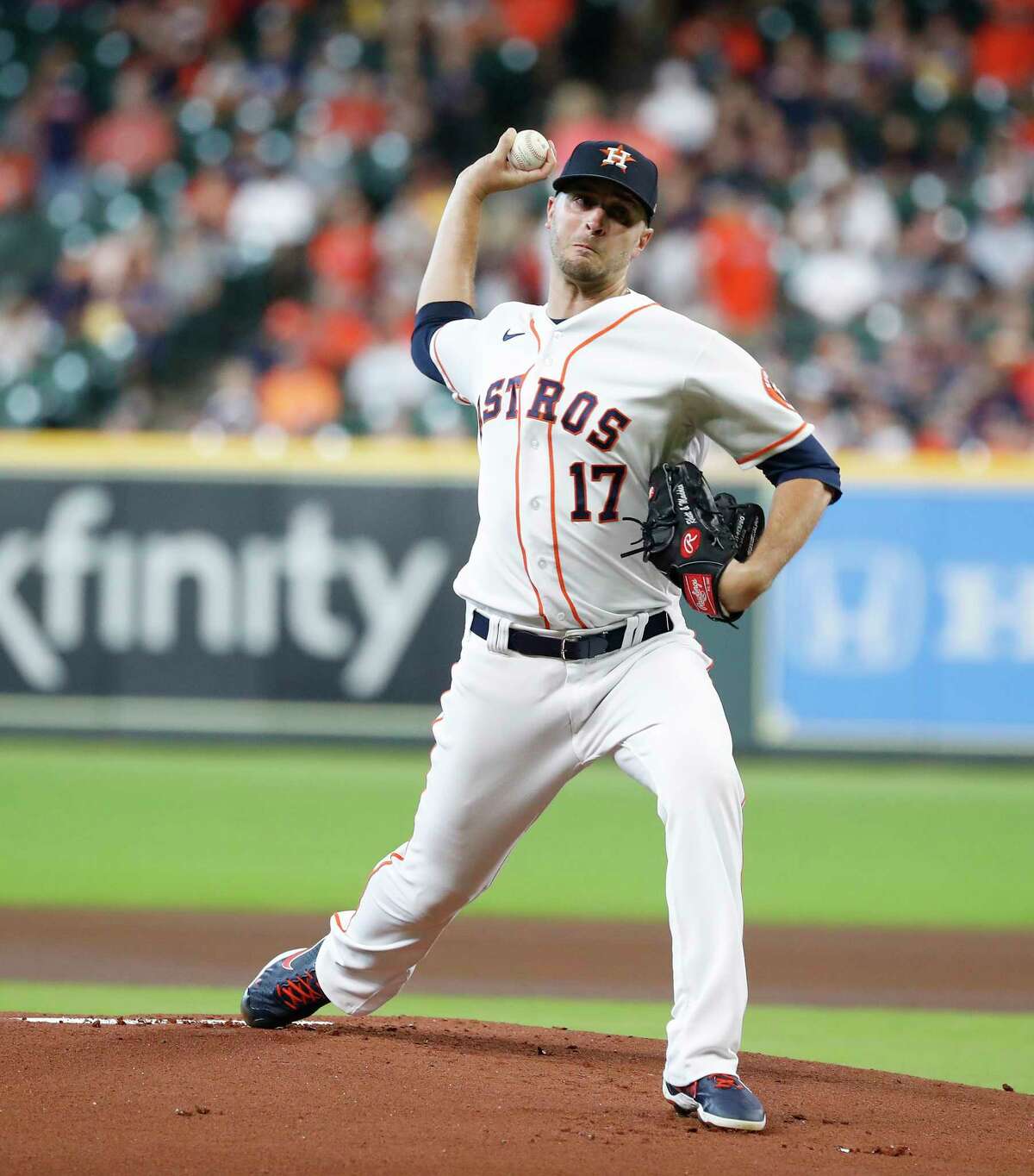 Houston Astros starting pitcher Jake Odorizzi (17) pitches during the first inning of an MLB baseball game at Minute Maid Park, Saturday, August 21, 2021, in Houston.