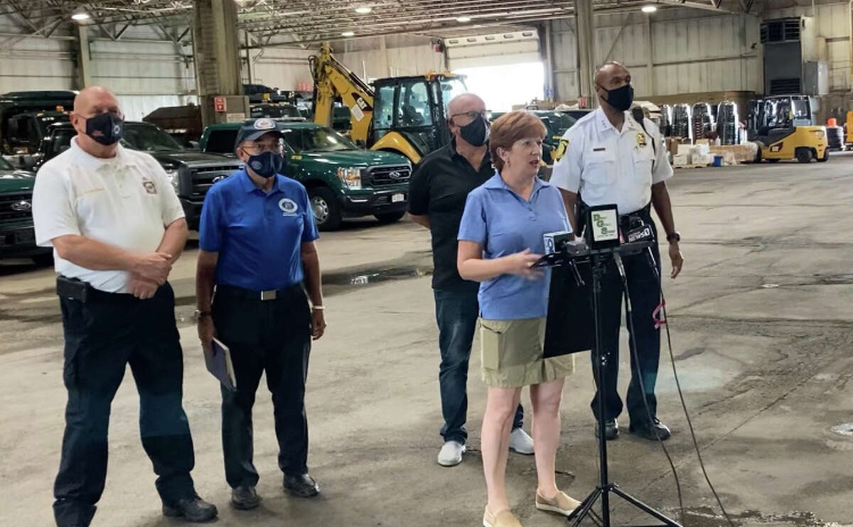 Albany Mayor Kathy Sheehan, center, holds a press conference with other city officials  about preparations Albany is making before Hurricane Henri reaches the area.