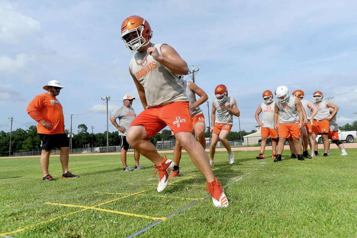 Orangefield gets in evening practice as they prep for the start of the 2021 football season. Photo made Tuesday, August 3, 2021 Kim Brent/The Enterprise