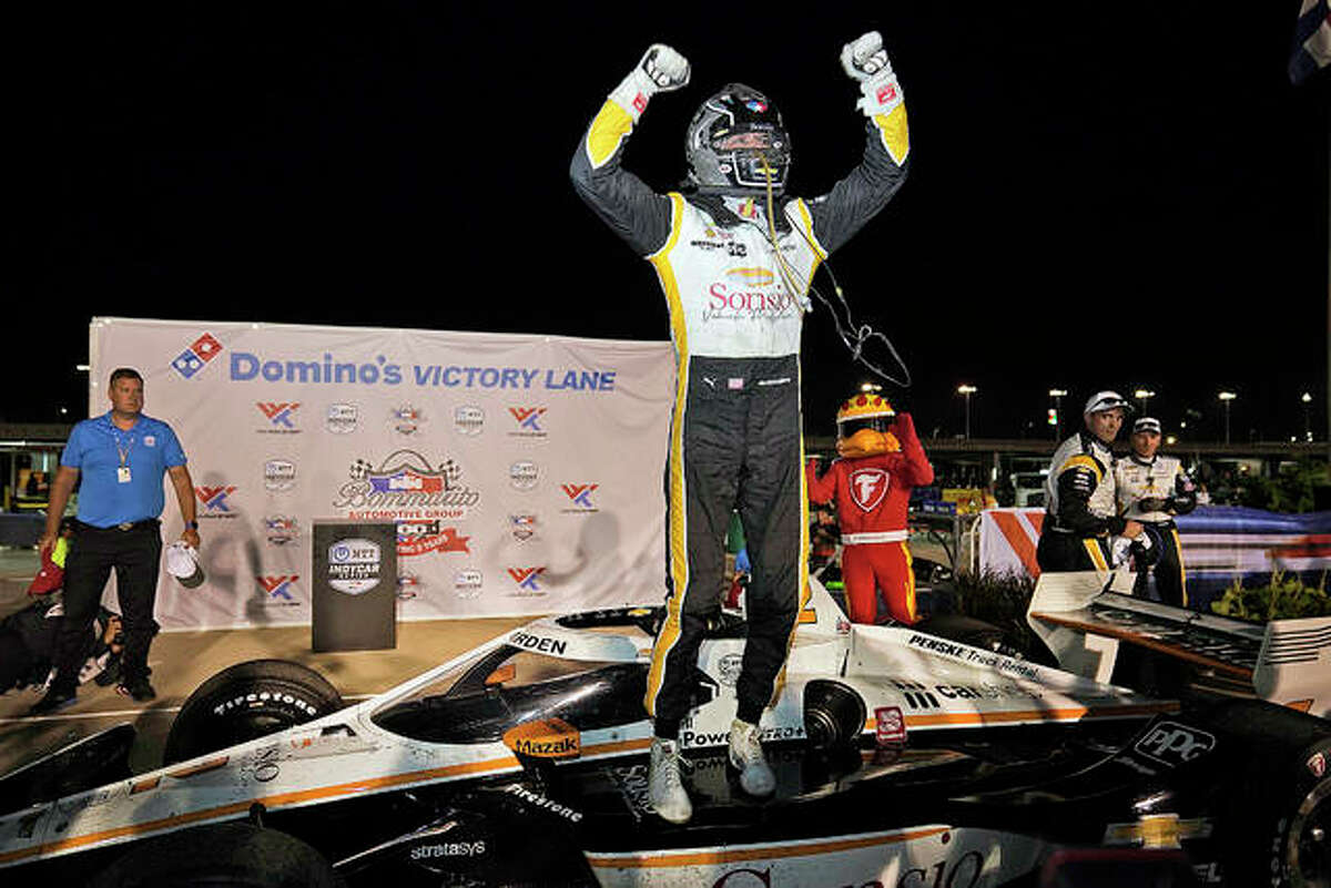Josef Newgarden celebrates after winning an IndyCar Bommarito 500 race at World Wide Technology Raceway Saturday night in Madison.