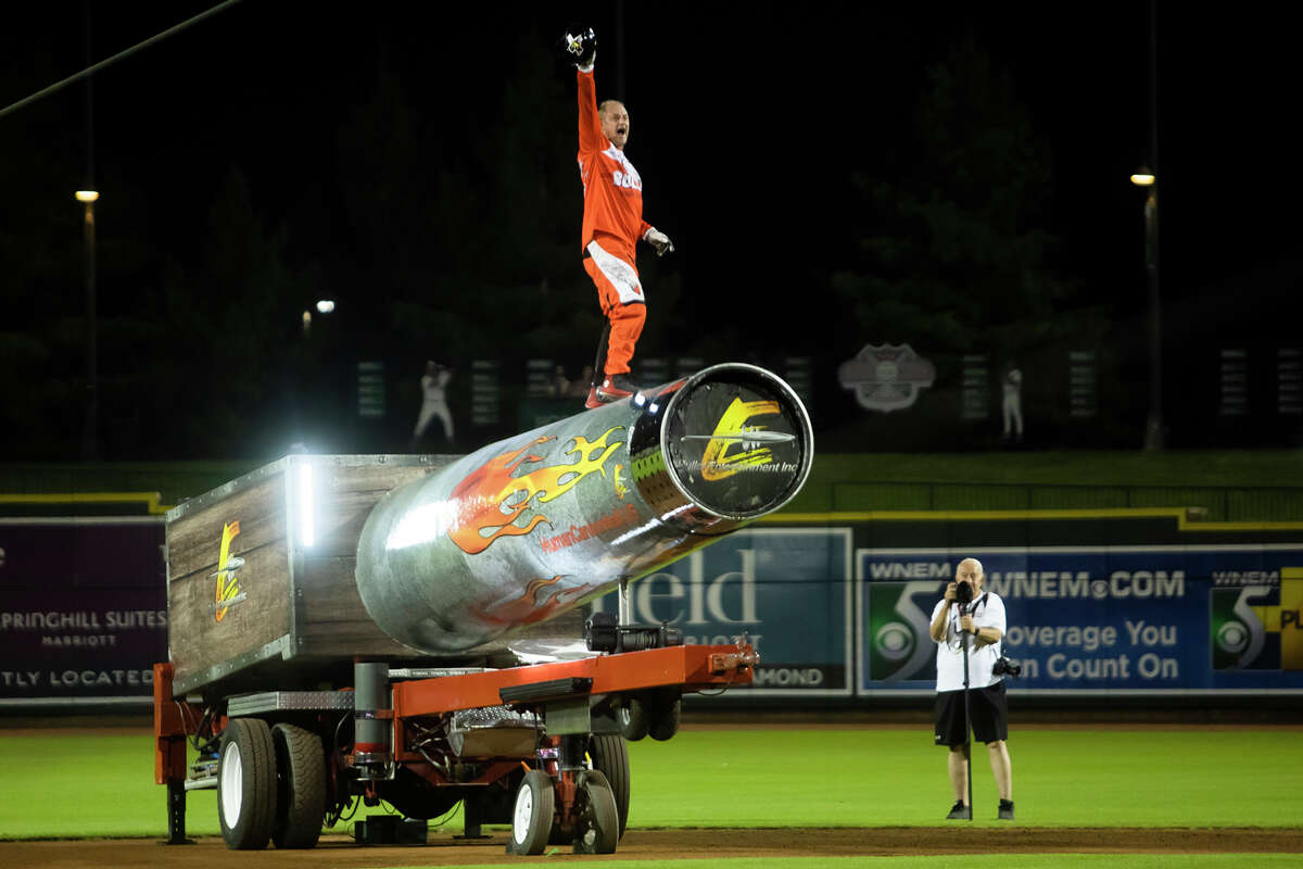 David "The Bullet" Smith launches himself out of a cannon after the Great Lakes Loons' game against the Lansing Lugnuts Friday, Aug. 20 at Dow Diamond. (Katy Kildee/kkildee@mdn.net)