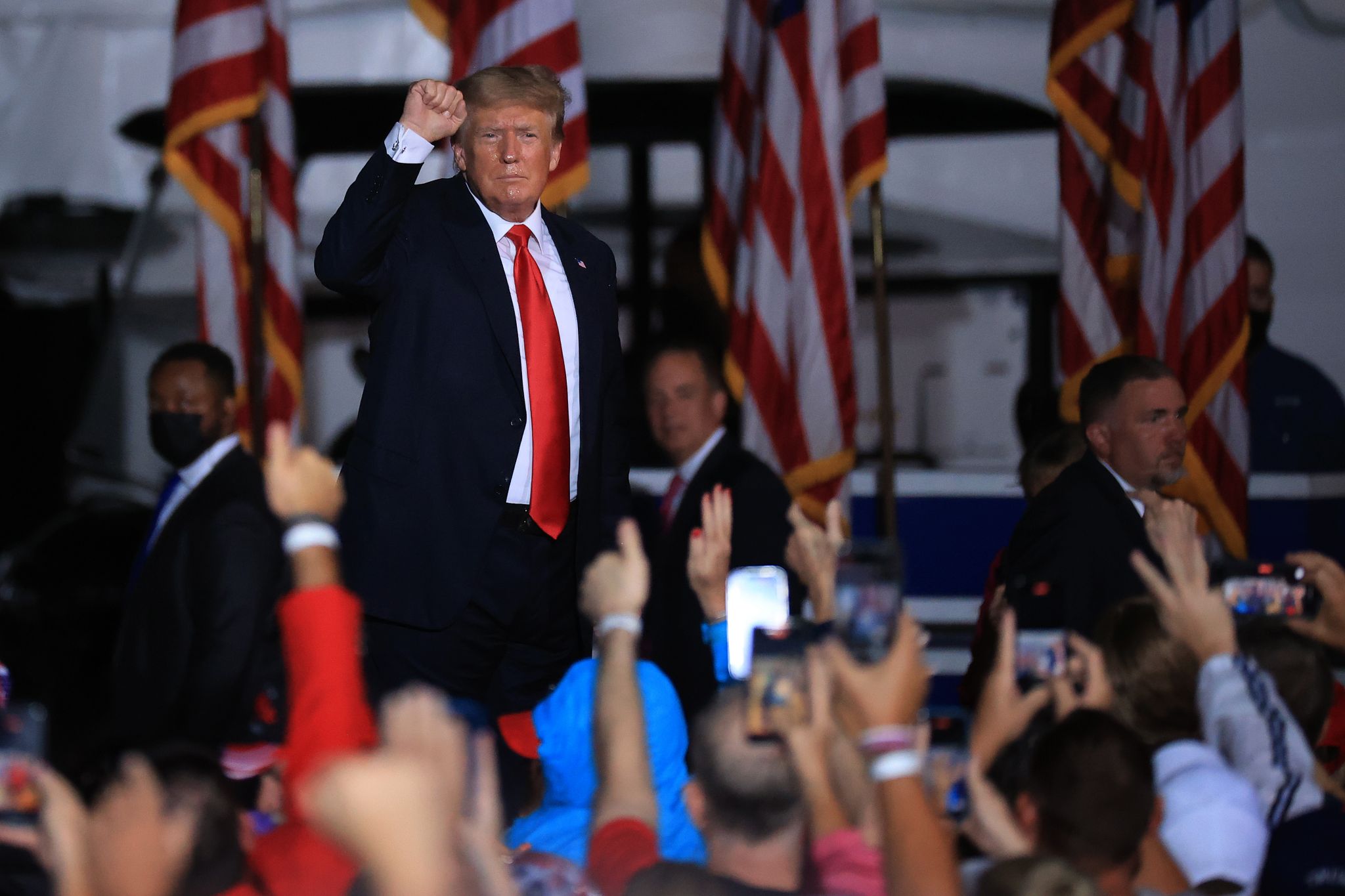 Trump booed by some of his supporters after encouraging COVID vaccine ...