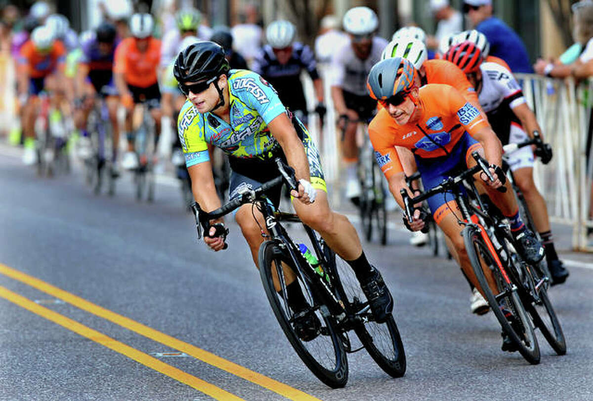 Riders compete in the Masters 40+ and 50+ race at the Criterium Festival Saturday in Edwardsville.