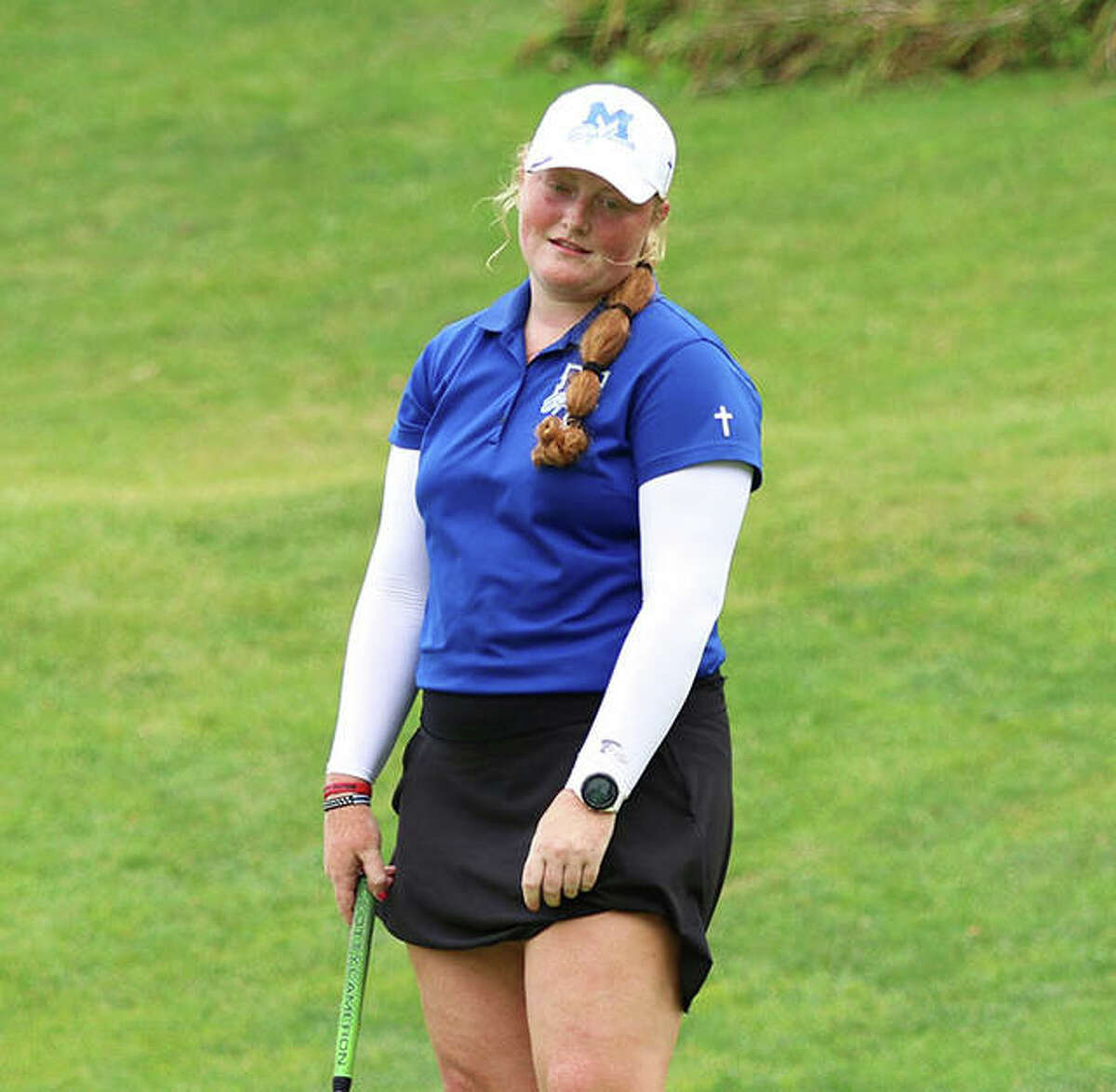 Marquette’s Gracie Piar reacts as her birdie putt an inch or two short of the cup on hole No. 12 at the Blast Off Tourney on Saturday at Olin. Piar made five birdie putts and two more for eagle while shooting a 6-under par 66 to win the tourney by four shots.