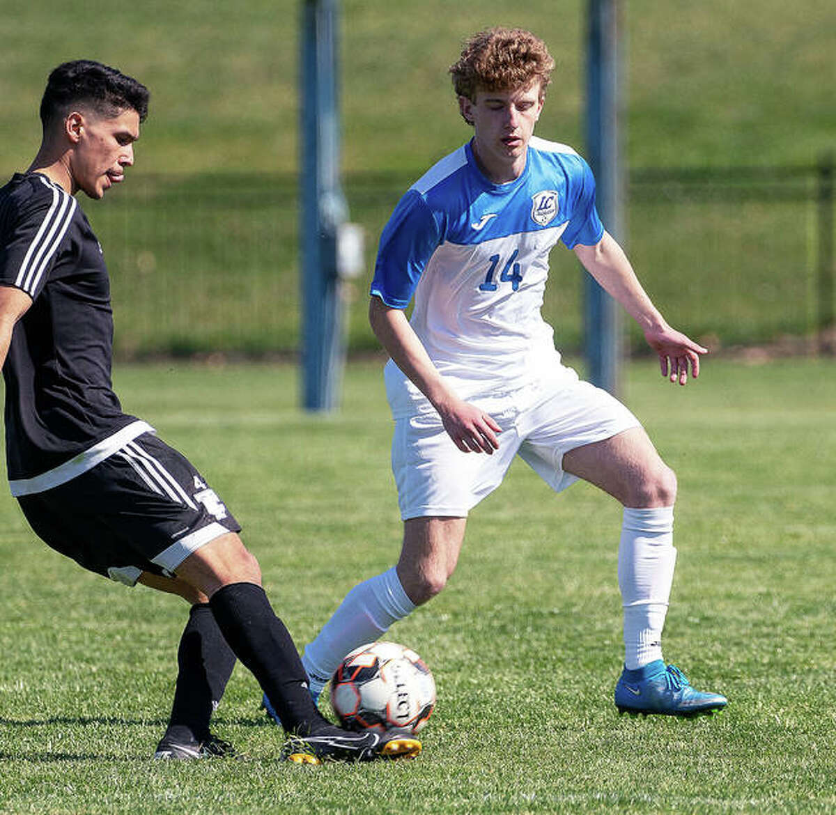 LCCC’s Brayden Decker (14), a sophomore from Alton, scored a first-half goal in his team’s 2-0 victory over College of Lake County Sunday in Grayslake. LCCC, which also won Saturday 6-1 over Oakton Community College, is 2-0 on the season.