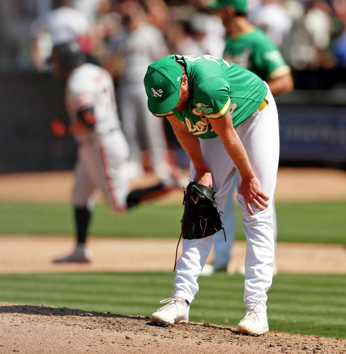 Reliever Sergio Romo giving A's another late-innings option