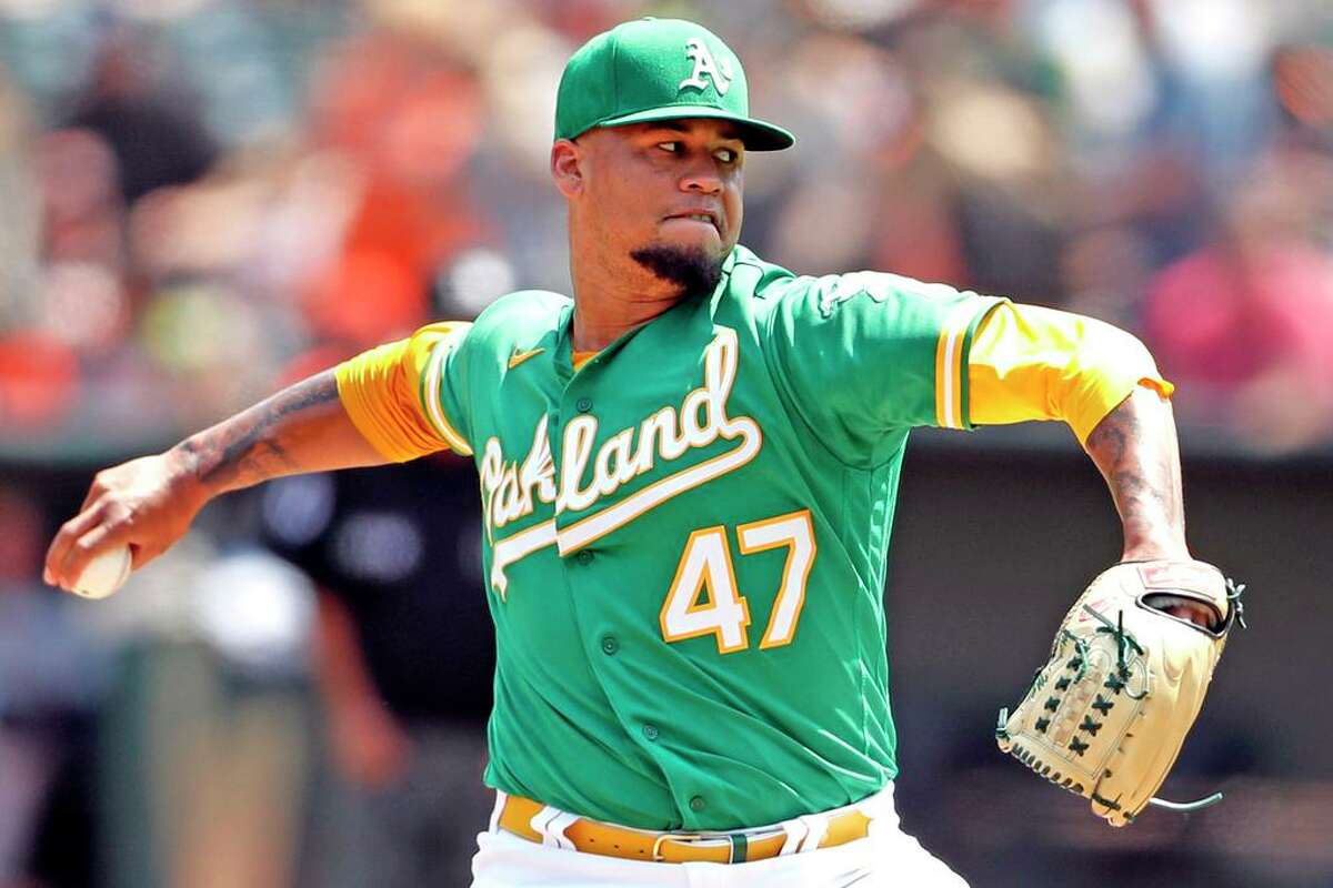 Oakland Athletics' Frankie Montas pitches in 1st inning against San Francisco Giants during MLB game at Oakland Coliseum in Oakland, Calif., on Sunday, August 22, 2021.