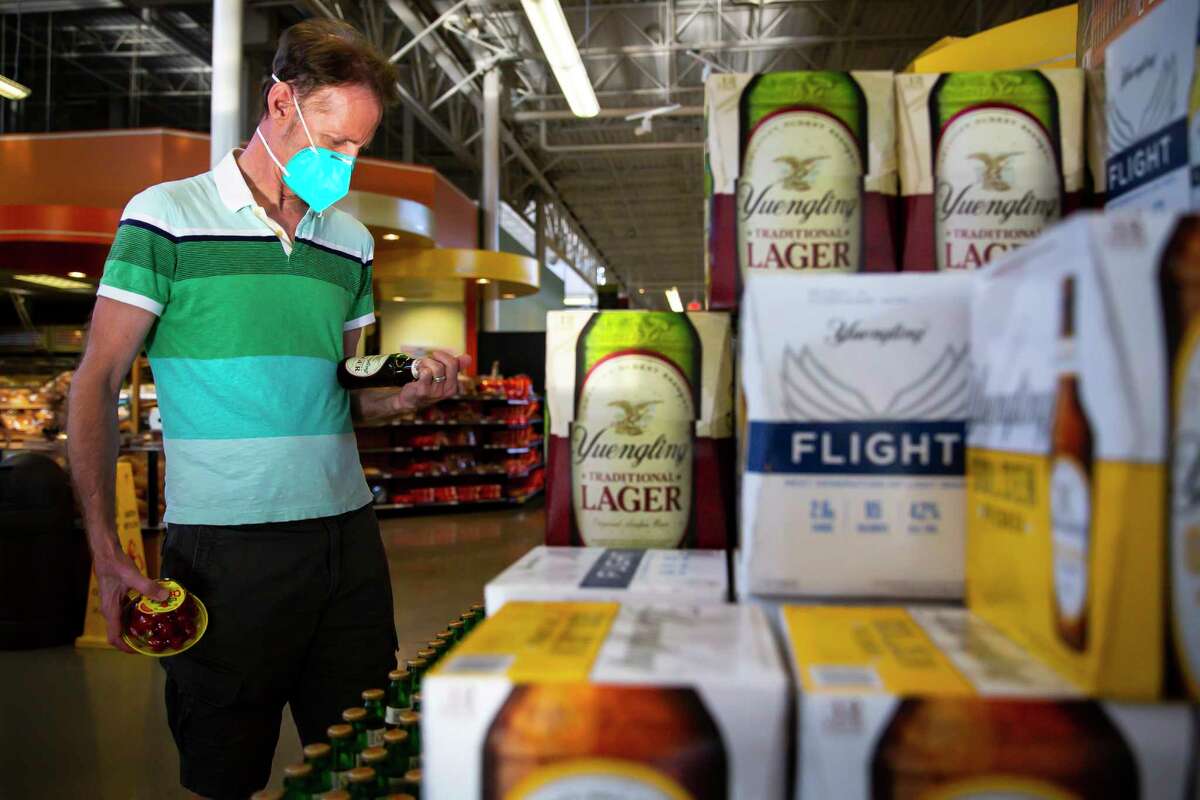 David West checks out the brand new Yuengling display as the beer makes its Houston debut at the H-E-B in Montrose on Monday, Aug. 23, 2021.
