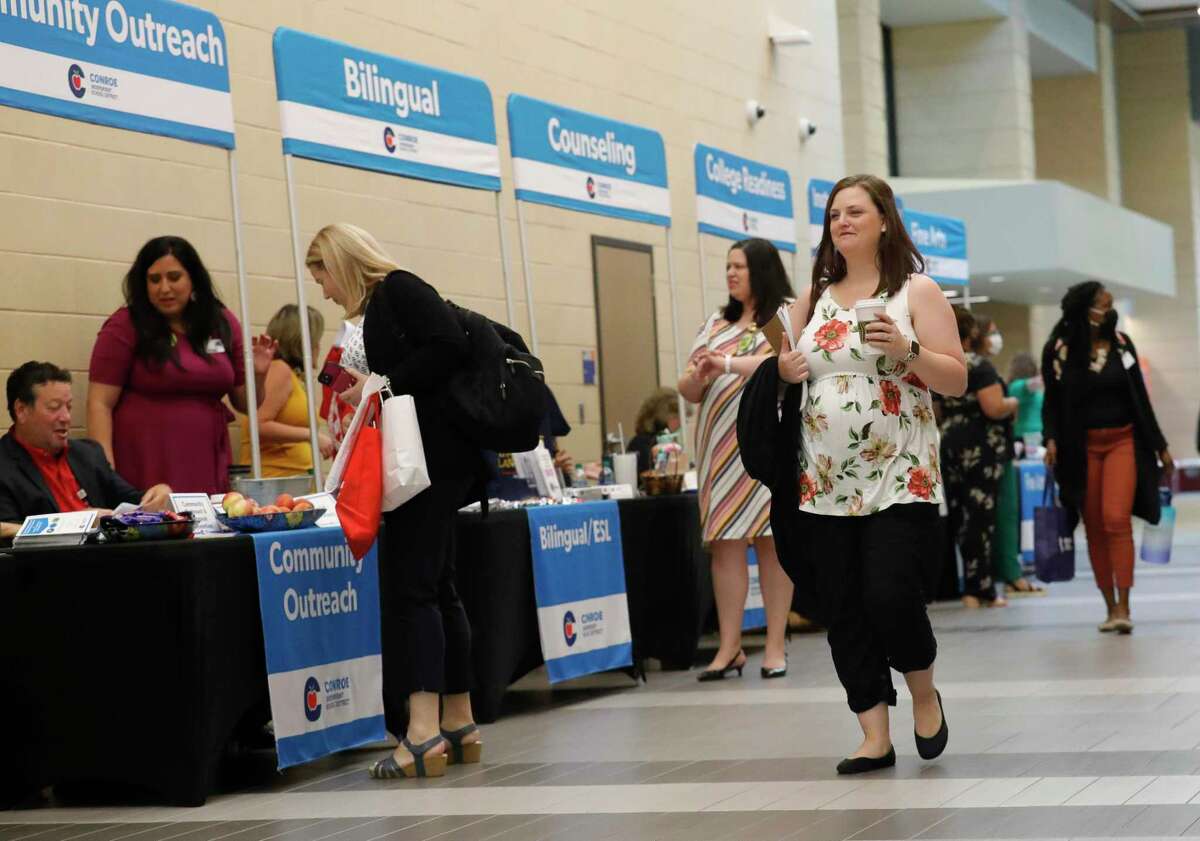 New teachers to Conroe ISD walk through various booths during new teacher orientation at Grand Oak High School in July. The district has increased substitute pay in hopes of boosting its substitute fill rate above 69 percent.