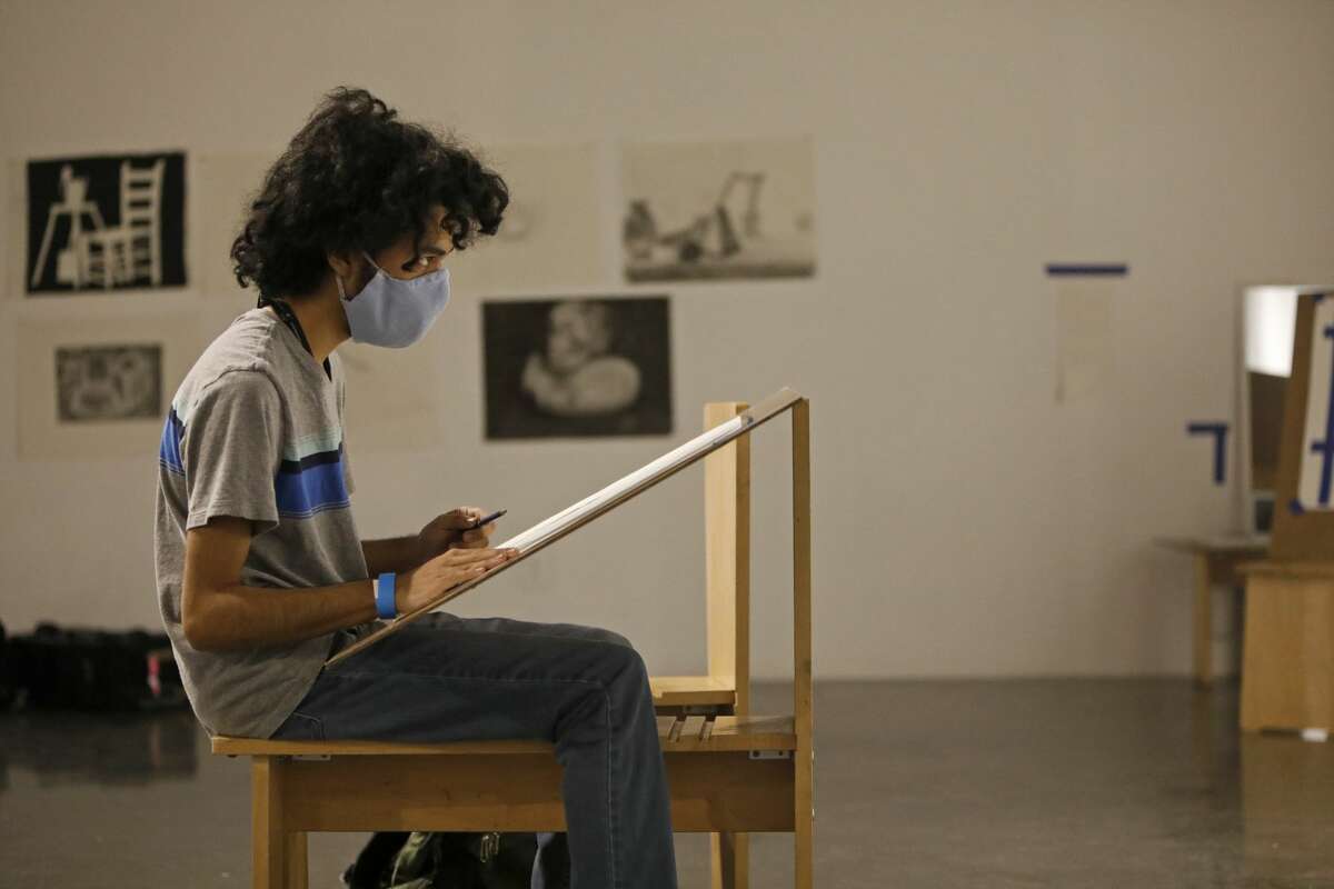 A student is seen creating art at the Southwest School of Art students in Nov. 9, 2020. The University of Texas at San Antonio and the Southwest School of Art are combining to create a new art school in downtown San Antonio.