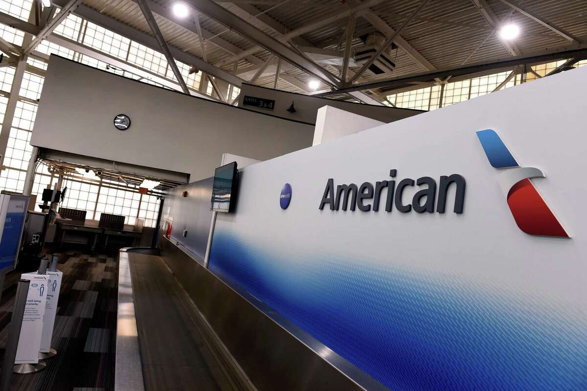 The empty American Airlines check-in area in the terminal at Tweed New Haven Regional Airport in New Haven Dec. 21, 2020.