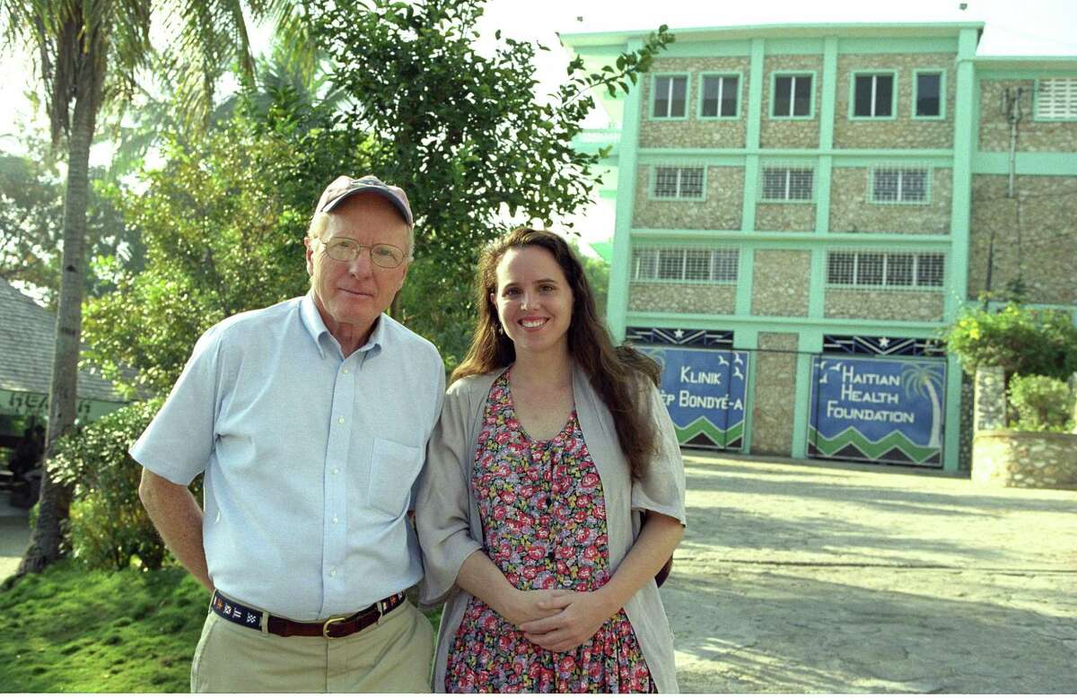 Dr. Jeremiah Lowney, founder of the Haitian Health Foundation, and his daughter, Marilyn Lowney, executive director, outside the charity's clinic in Jérémie.