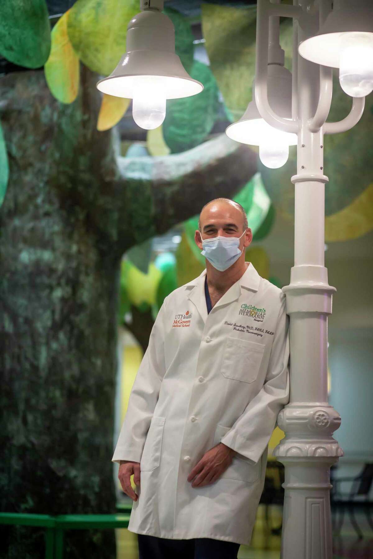Dr. David Sandberg, professor and chief of pediatric neurosurgery at McGovern Medical School at UTHealth, and Director of Pediatric Neurosurgery at the Memorial Hermann Mischer Neuroscience Institute, poses for a portrait at Memorial Hermann on the Texas Medical Center campus in Houston on Thursday, Aug. 12, 2021. Dr. Sandberg performed a live-saving surgery on five year old Jakota Kellis earlier this year to remove a ruptured cyst.