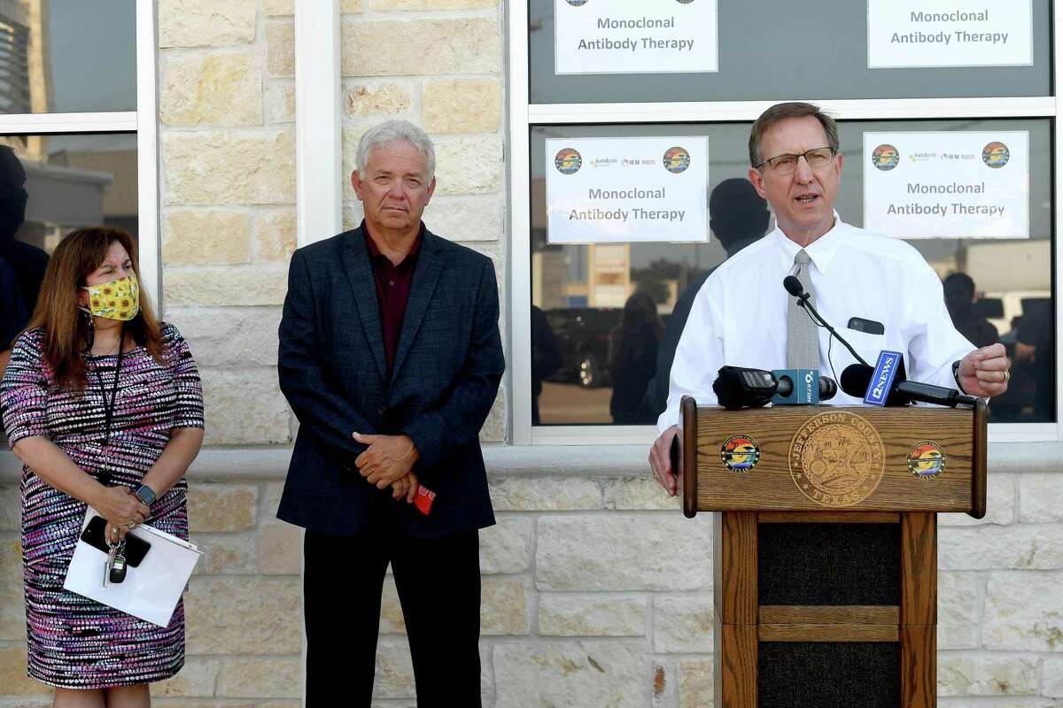 Allison Getz and Johnn Gothia listen as Jefferson County Judge Jeff Branick talks about the new monoclonal antibody infusion center that opened Monday to help treat patients with COVID-19. The new center will be able to treat up to 150 patients daily, significantly increasing the number that can be treated amid a steep rise in cases. The treatment is free to patients 12 and older who are within 10 days of conntracting the virus and are not experiencing severe respiratory problems, Photo made Monday, August 23, 2021 Kim Brent/The Enterprise