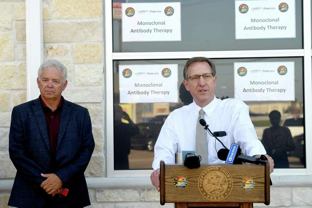 John Gothia stands by as Jefferson County Judge Jeff Branick talks about the new monoclonal antibody infusion center that opened Monday to help treat patients with COVID-19. The new center will be able to treat up to 150 patients daily, significantly increasing the number that can be treated amid a steep rise in cases. The treatment is free to patients 12 and older who are within 10 days of conntracting the virus and are not experiencing severe respiratory problems, Photo made Monday, August 23, 2021 Kim Brent/The Enterprise
