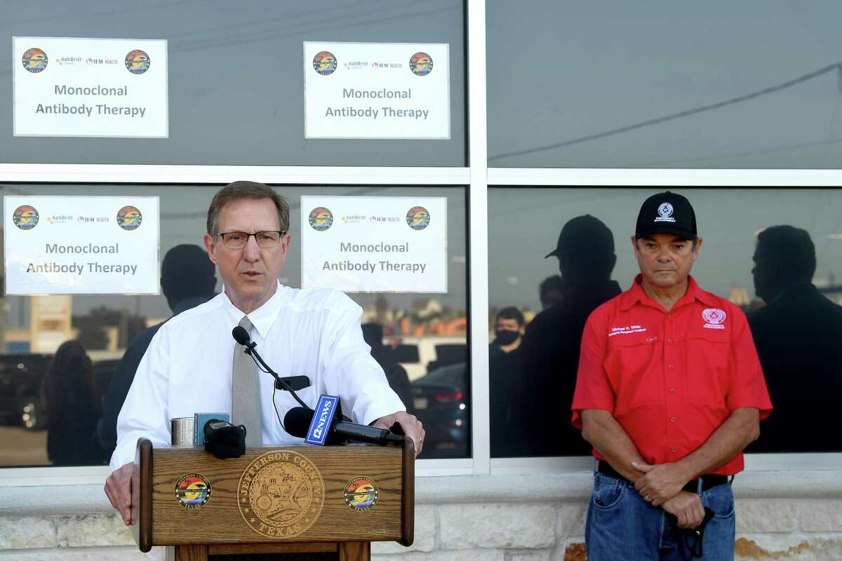 Michael White stands by as Jefferson County Judge Jeff Branick talks about the new monoclonal antibody infusion center that opened Monday to help treat patients with COVID-19. The new center will be able to treat up to 150 patients daily, significantly increasing the number that can be treated amid a steep rise in cases. The treatment is free to patients 12 and older who are within 10 days of conntracting the virus and are not experiencing severe respiratory problems, Photo made Monday, August 23, 2021 Kim Brent/The Enterprise