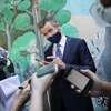California Gov. Gavin Newsom speaks with reporters at Carl B. Munck Elementary School, Wednesday, Aug. 11, 2021, in Oakland, Calif. 