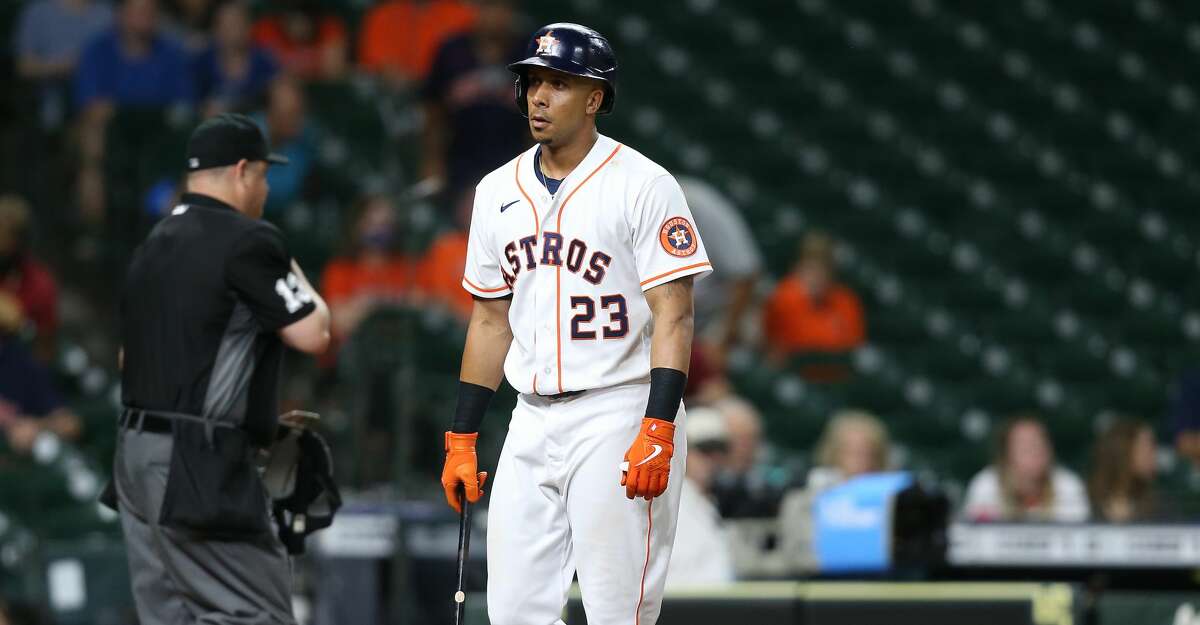 Houston Astros left fielder Michael Brantley (23) reacts to striking out ending the ninth inning against the Kansas City Royals at Minute Maid Park in Houston on Monday, Aug. 23, 2021. Kansas City Royals won the game 7-1.