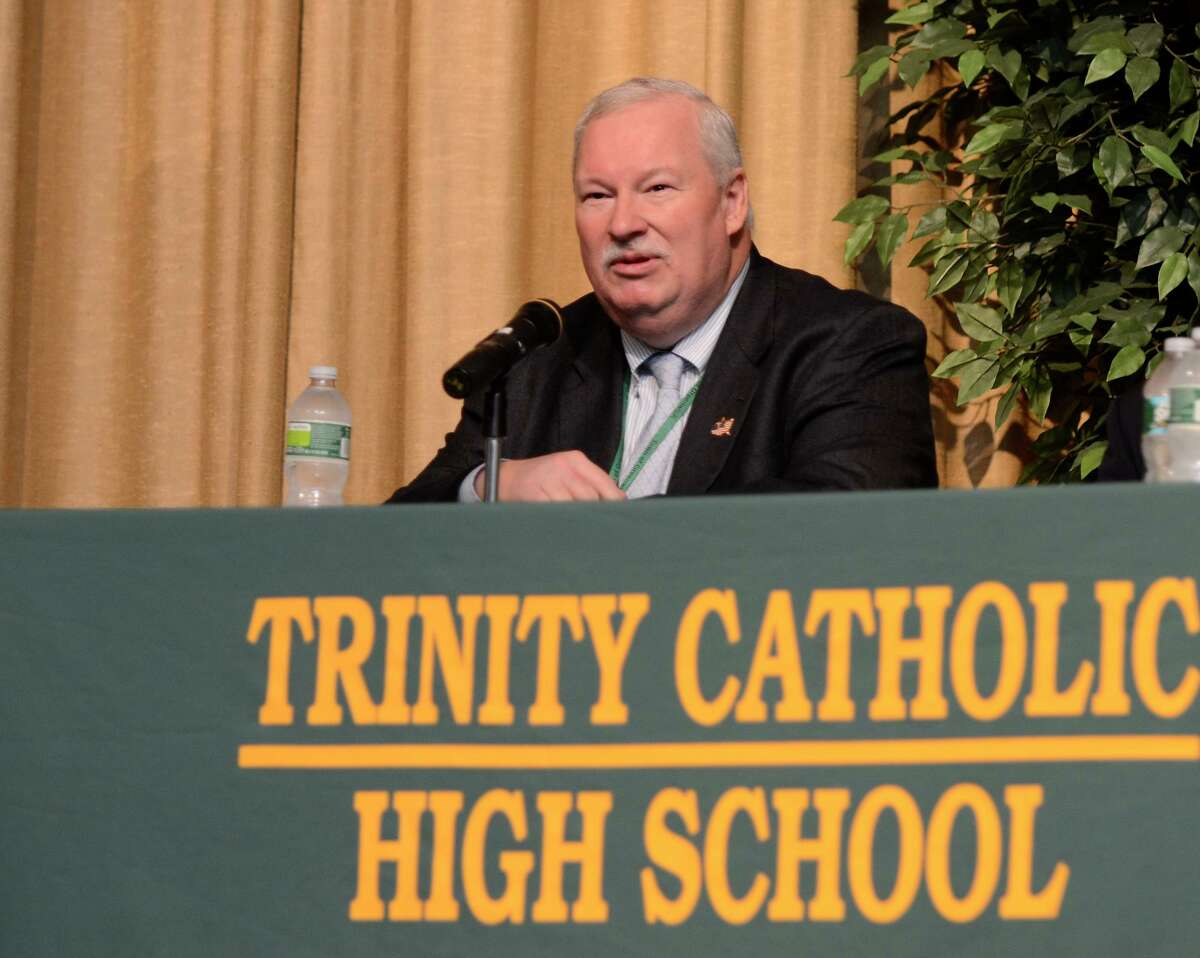 Dan Warzoha, who was the Greenwich fire chief at the time of the September 11 terrorist attacks, speaks at an assembly on September 29, 2011 at Trinity Catholic High School in Stamford. Students and staff heard from people directly affected by the September 11 terrorist attacks.