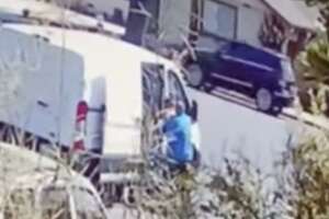 Video: Man appears to force woman inside stolen South Bay van