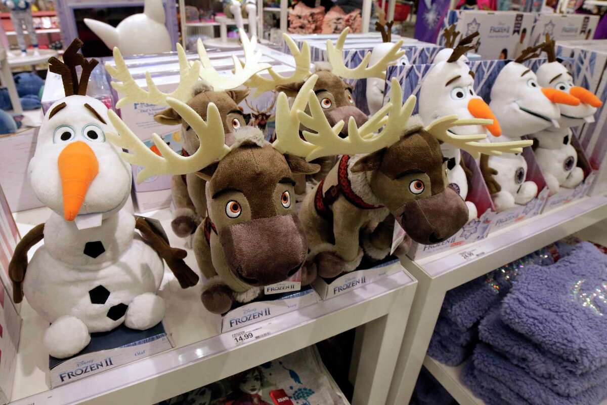 Stuffed figures from the movie “Frozen” on display at a “Disney Store within a store” at a Target in Spring, Texas. Disney Store is closing dozens of locations nationally in September 2021, with parent company Walt Disney stating it will rely more on other retail stores carrying its merchandise along with online sales and theme park shops.