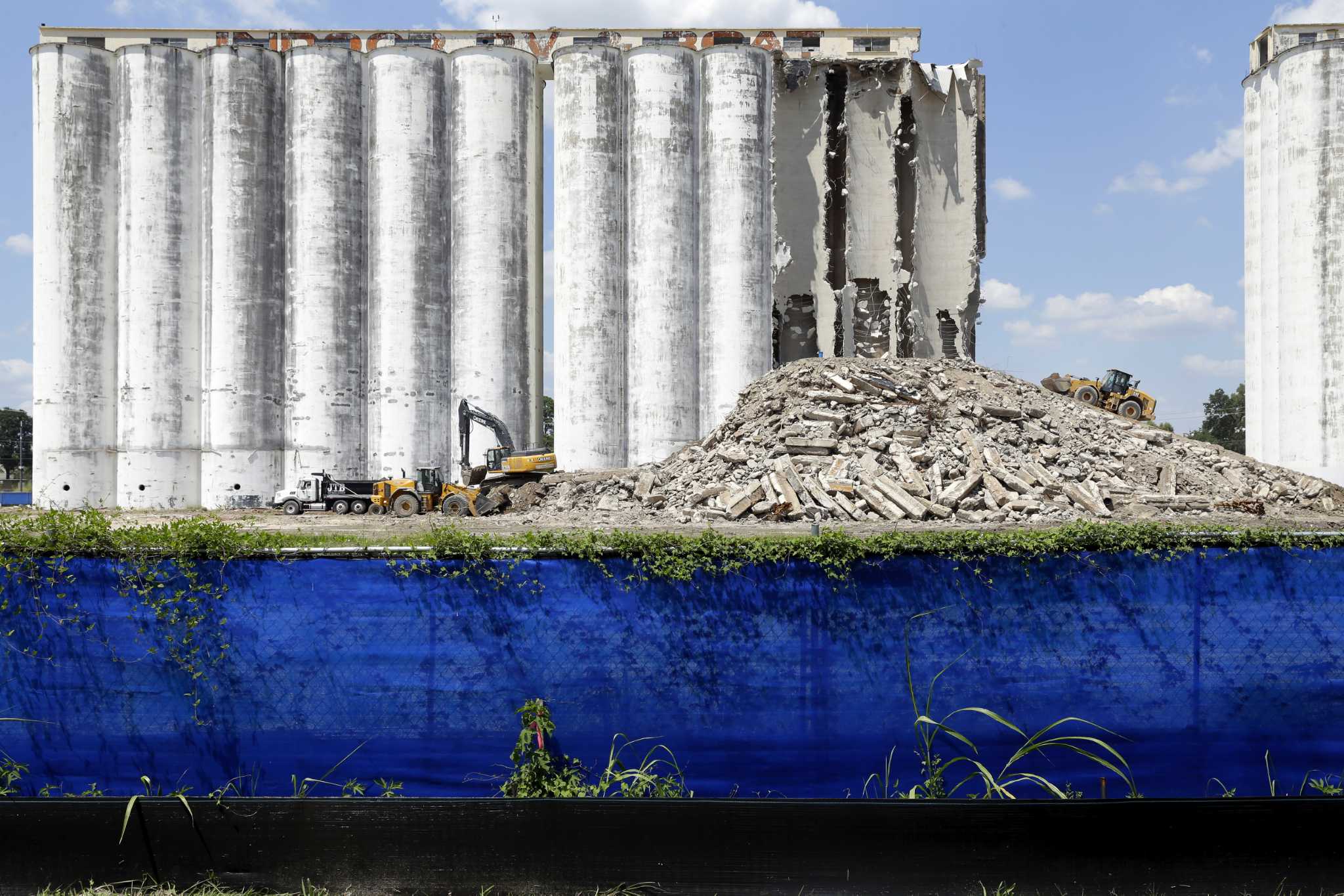 Demolition begins on towering west Houston grain silos, making way for