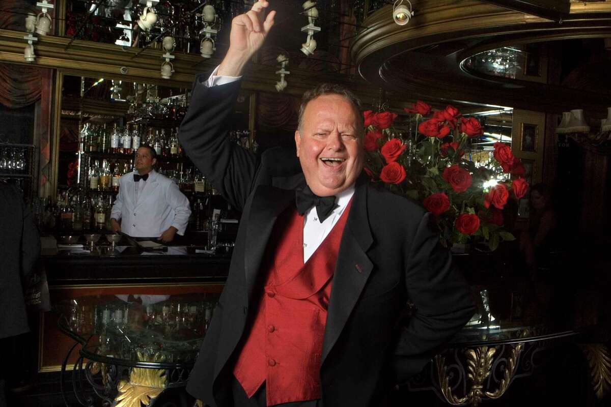 Harry Denton in front of his signature six dozen roses at Harry Denton’s Starlight Room at the top of the Sir Francis Drake Hotel in 2009.