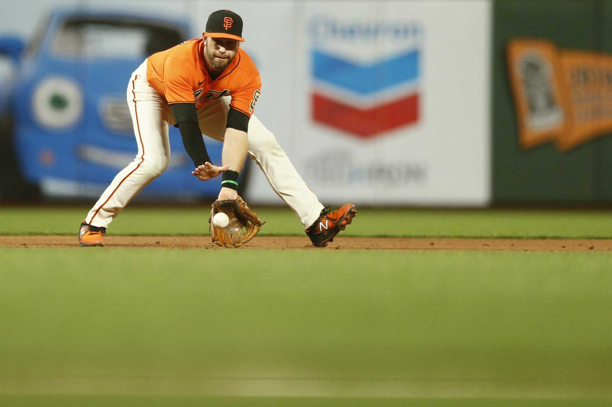 Giants' Longoria on injured list with hand injury, Gausman to COVID IL