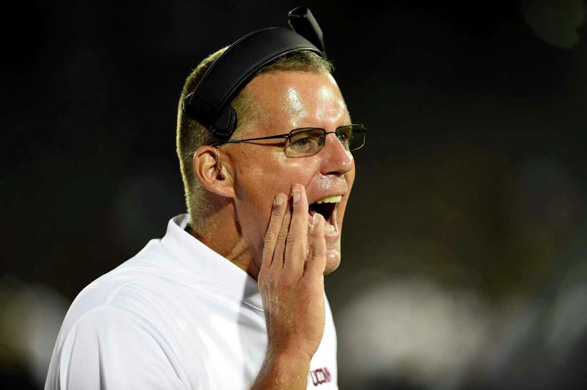 UConn coach Randy Edsall yells to a player on the field during the fourth quarter against Central Florida in 2018.