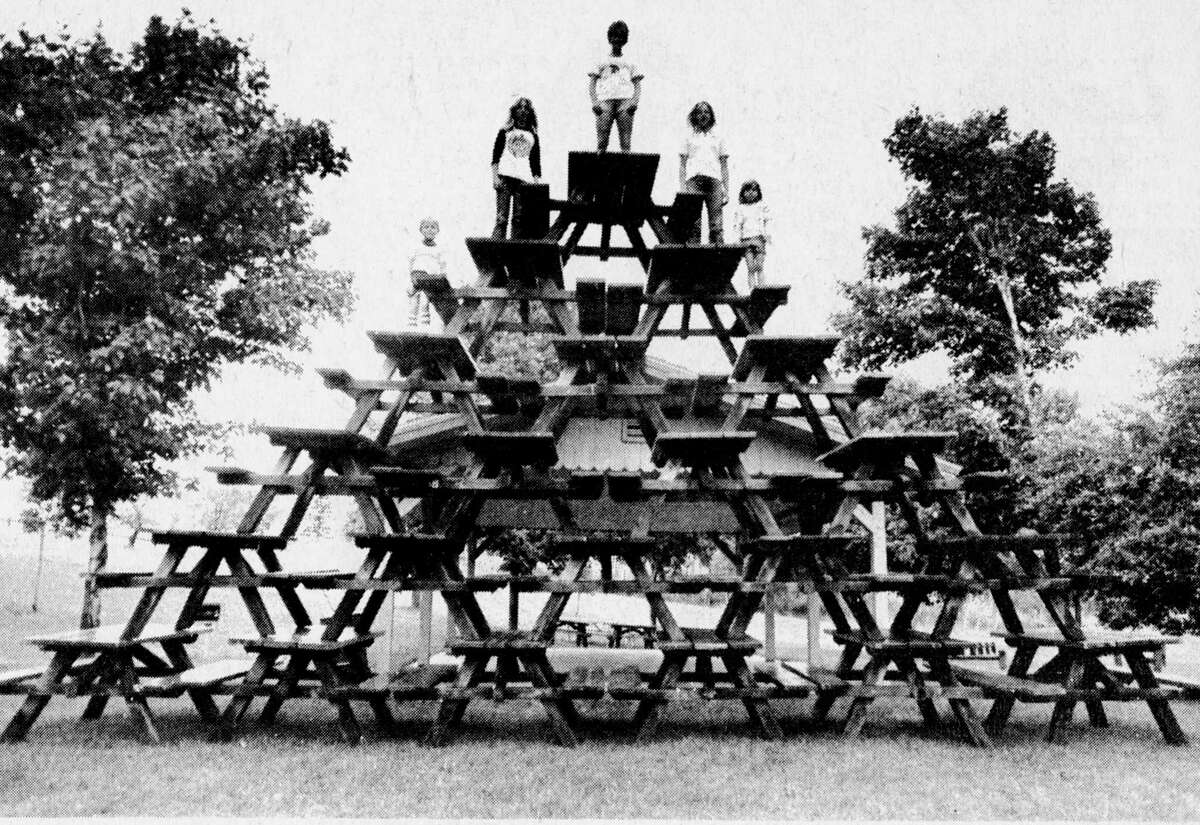 It took 21 picnic tables and some awfully energetic pranksters to put together this pyramid at Orchard Beach State Park. The pyramid was assembled overnight by persons unknown. The photo was published in the News Advocate on Aug. 26, 1981. (Manistee County Historical Museum photo)