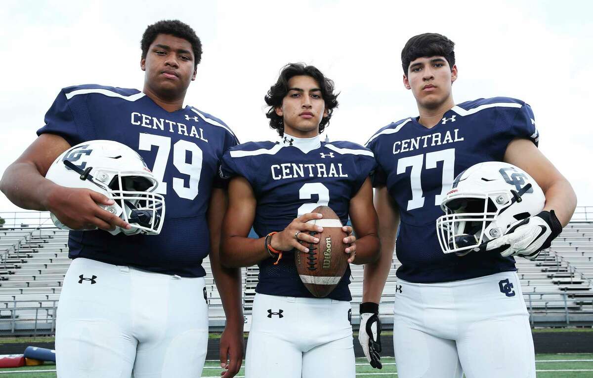 Central Catholic senior quarterback and Army commit Sylas Gomez, center, feels confident in the pocket behind tackles and fellow seniors Ben Rios, right, and Deandre Marshall, close friends who are committed to UTSA.
