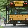 Children arrive for the first day of school at Coleytown Elementary School. Tuesday, Sept. 8, 2020