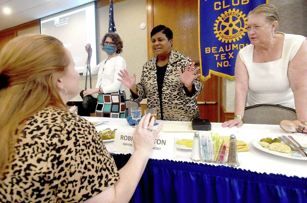 Beaumont Mayor Robin Mouton talks with Rotarians Jennifer Gregory (left) and Barb Newhouse after delivering a keynote speech at the weekly Beaumont Rotary Club meeting Wednesday. Photo made Wednesday, August 25, 2021 Kim Brent/The Enterprise