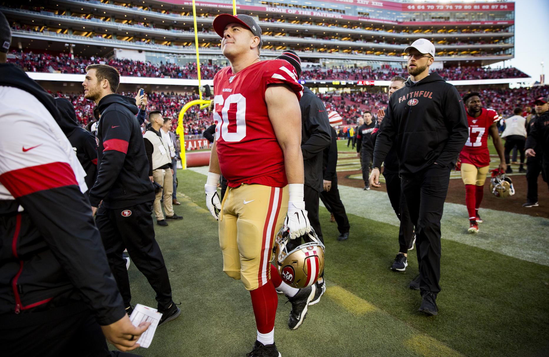 San Francisco 49ers guard Daniel Brunskill (60) spikes the ball