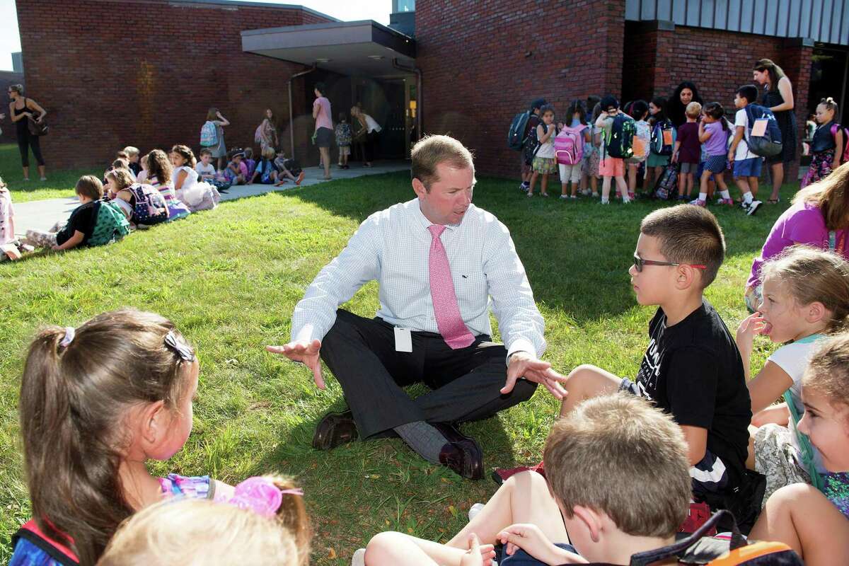 Wilton Schools Superintendent Kevin Smith talks with Miller-Driscoll students on the first day of school in 2018.