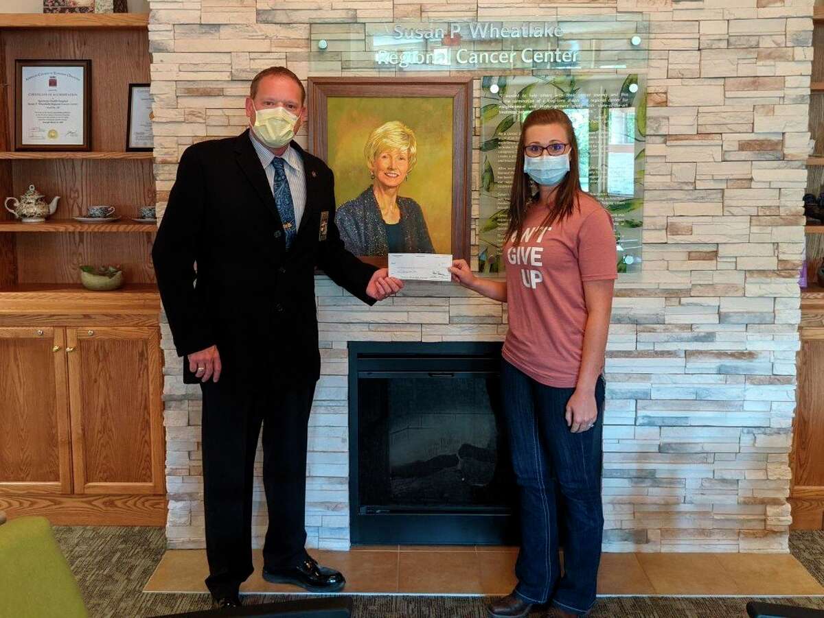 Lake County Sheriff Rich Martin presented a $2,000 check to the Susan P. Wheatland Cancer Center in Reed City as part of the ongoing Sheriff's charity campaign. (Submitted photo)