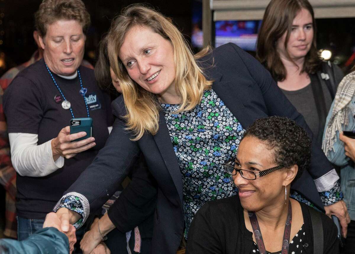 California Assembly District 15 candidate Buffy Wicks greets supporters during a campaign election night party at the Golden Squirrel in Oakland, Calif. Tuesday, Nov. 6, 2018.