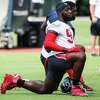 Houston Texans defensive end Charles Omenihu (94) stretches during an NFL training camp football practice Thursday, Aug. 26, 2021, in Houston.