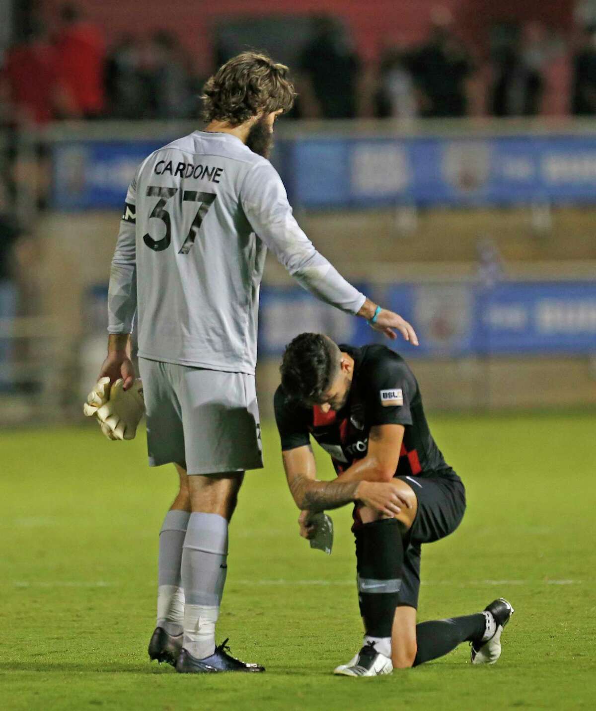 SAFC goalie Matthew Cardone consoles SAFC Mitchell Taintor after they lost in OT 1-0. San Antonio FC vs. New Mexico United in Western Conference Quarterfinal match on Saturday, October 10, 2020 at Toyota Field.